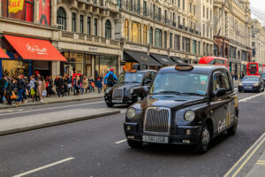 London black cab on regent street with Gett logo on the side